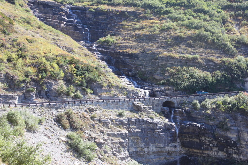 Going-to-the-Sun Road, cliffside bridge and waterfall