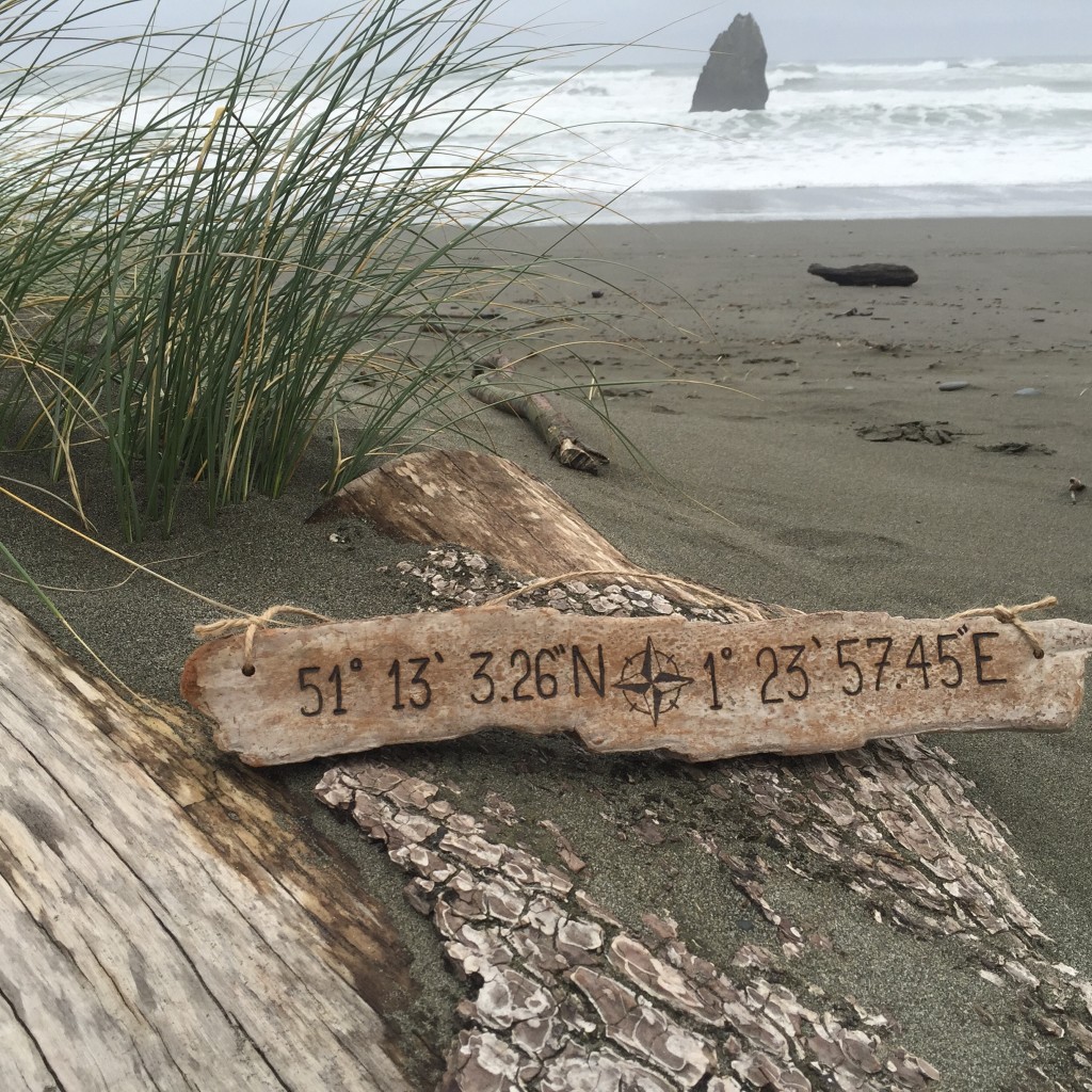 I take a photograph of every single piece of driftwood artwork we make. Not all of them are GOOD photographs, however, this one taken on the beach, between the storms (with my favorite little sea stack) is my absolute favorite. And the custom coordinate sign was our most popular order this holiday season!